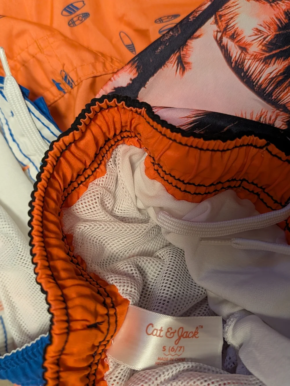 Set Of 2 Kids Swim Trunks - Orange & Black Sunset and Bright Orange Surf